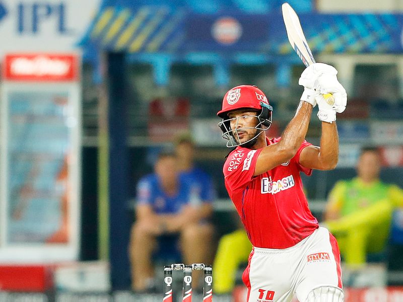 Mayank Agarwal of Kings XI Punjab hits a boundary.  