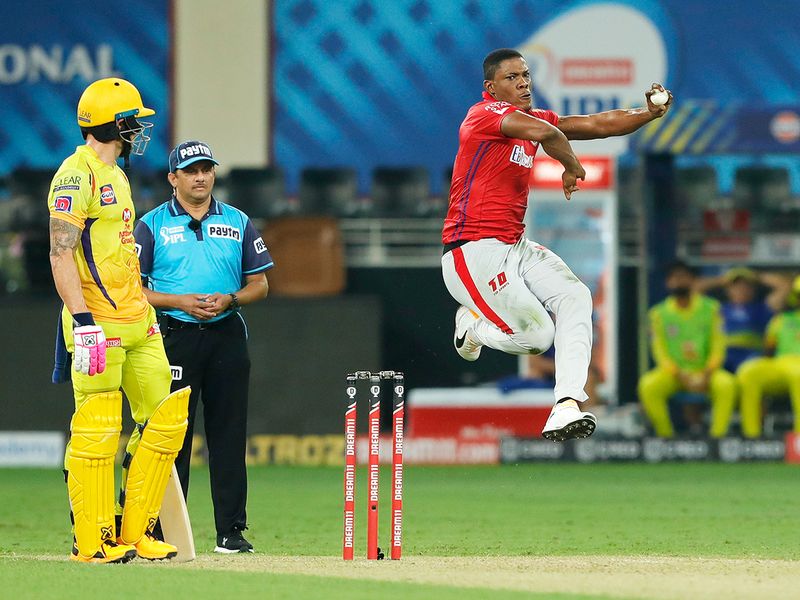 Sheldon Cottrell of Kings XI Punjab bowls. 