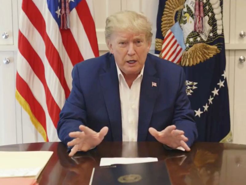 U.S. President Donald Trump, who is being treated for the coronavirus disease (COVID-19) in a military hospital outside Washington, speaks from his hospital room, in this still image taken from a video supplied by the White House, October 3, 2020. The White House/Handout via REUTERS THIS IMAGE HAS BEEN SUPPLIED BY A THIRD PARTY.