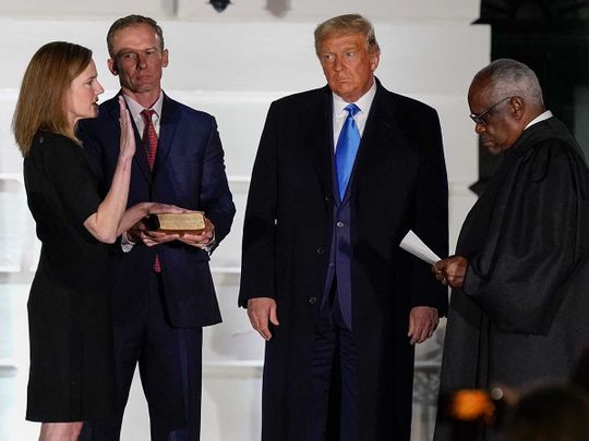 President Donald Trump watches as Supreme Court Justice Clarence Thomas Constitutional Oath to Amy Coney Barrett