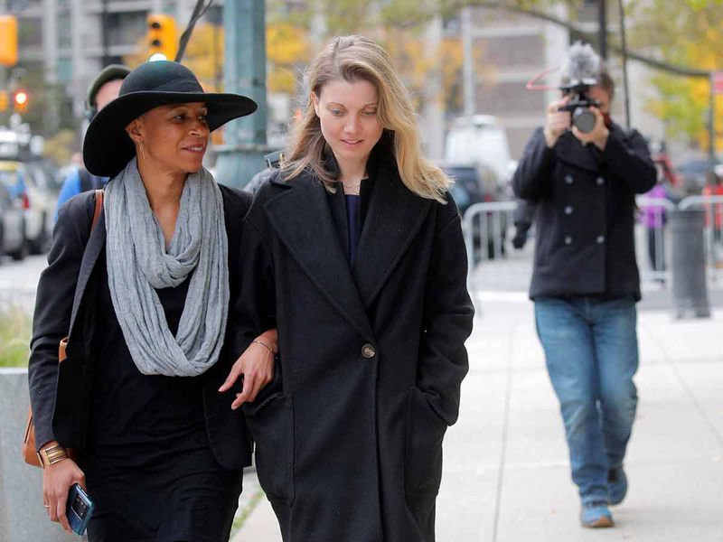 Michele Hatchette and Nikki Clyne, supporters of NXIVM cult leader Keith Raniere, exit following the sentencing hearing in the sex trafficking and racketeering case outside the Brooklyn Federal Courthouse in New York, U.S.,October 27, 2020.