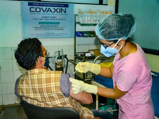 A medic administers Covaxin, developed by Bharat Biotech