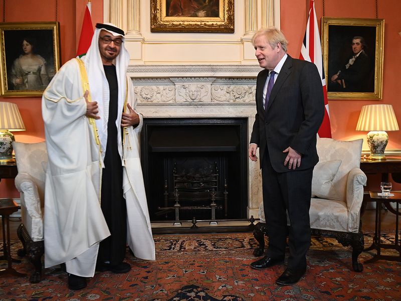 Boris Johnson, U.K. prime minister, right, speaks with Mohammed bin Zayed, Abu Dhabi's crown prince, during their bi-lateral meeting inside number in London.