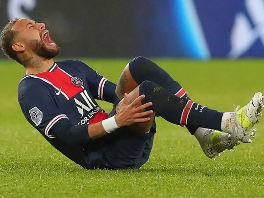 PSG's Neymar goes down injured v Lyon