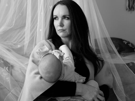 Kate Glaser and her 4-month-old baby at home. “I was going down a rabbit hole of guilt and stress,” Glaser said about testing positive for Covid-19.