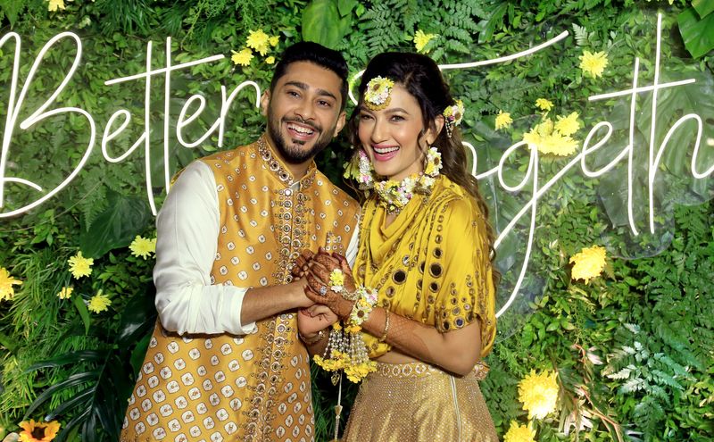 Model turned actress Gauhar Khan along with Zaid Darbar poses during their Mehndi ceremony