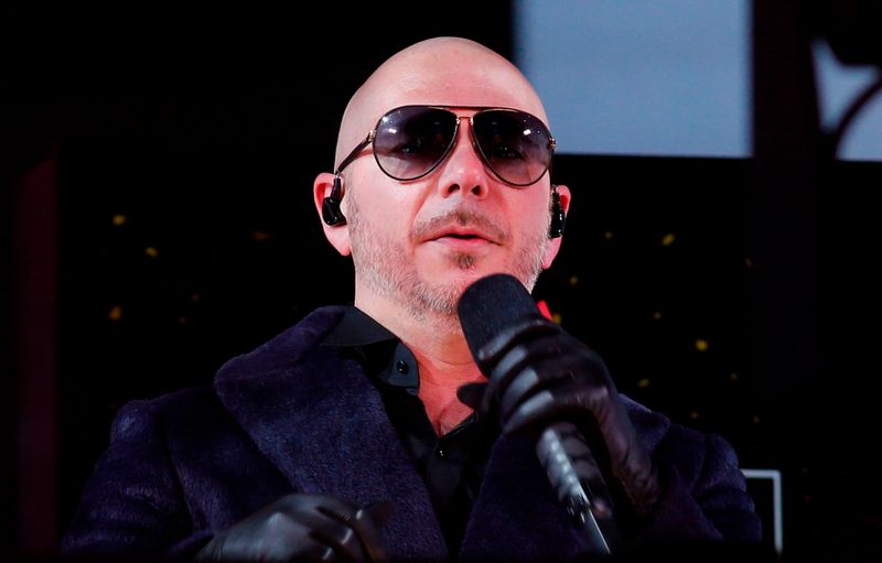 Singer Pitbull performs in Times Square during New Year's Eve celebrations on December 31, 2020 in New York City. (Photo by Gary Hershorn / various sources / AFP)