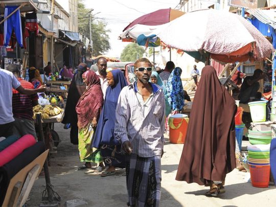 Somalis without facemasks visit the Bakara Market in Mogadishu. 
