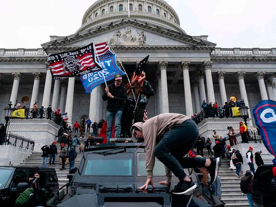 Supporters of US President Donald Trump protest outside the US Capitol.