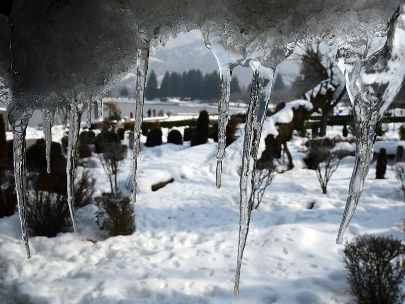 Jammu and Kashmir: A view of icicles hangs on a rooftop as the city records the coldest night of the season with the temperature dropping to minus 8.4 degrees celsius, in Srinagar on Thursday.