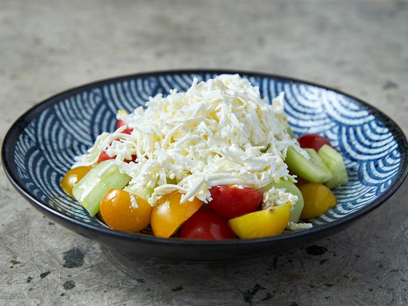 The shopska salad is full of juicy tomatoes and crunchy cucumbers
