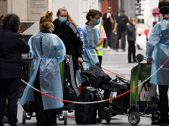 Tennis players, coaches and officials arrive in Melbourne before quarantining for two weeks ahead of the Australian Open 