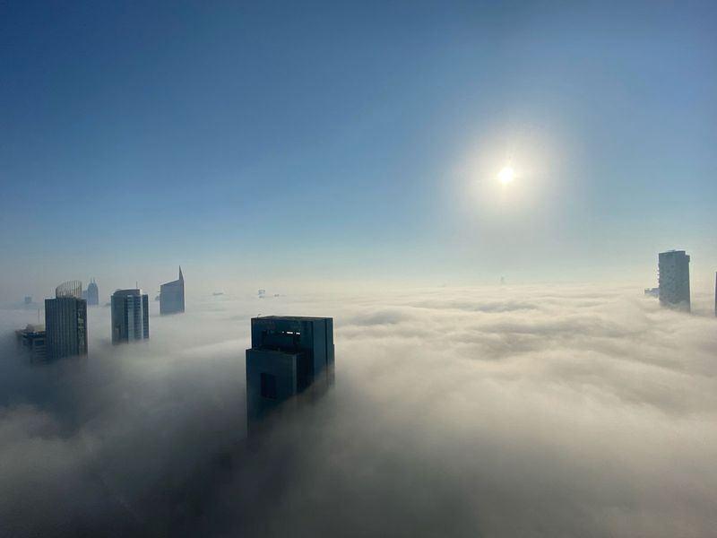 Fog in Dubai Marina, overlooking Sheikh Zayed Road and the Golf Course