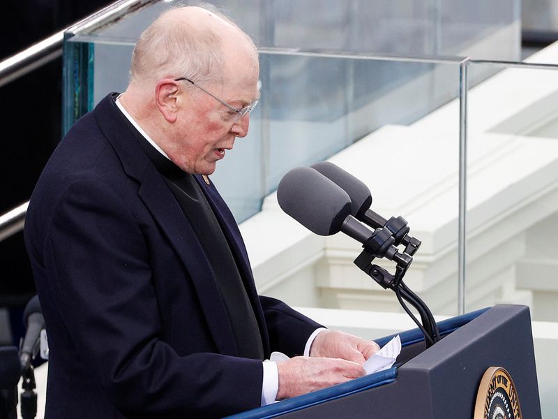 Father Leo J. O’Donovan delivers the invocation during the inauguration of Joe Biden on the West Front of the US Capitol in Washington. 