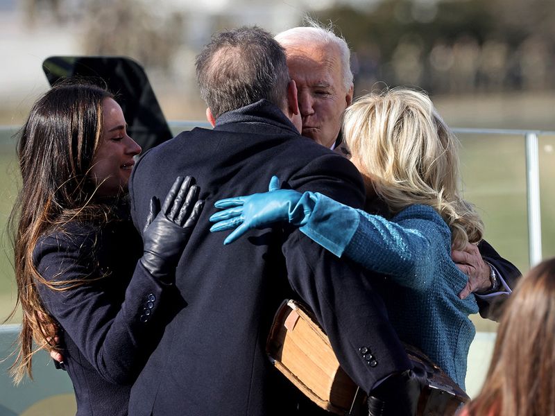 President Joe Biden hugs his wife Jill Biden and children Hunter and Ashley Biden after he is sworn in as the 46th President of the United States, at the US Capitol in Washington.  