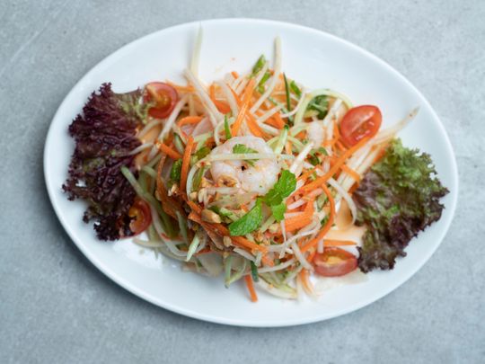 Vietnamese Goi Du Du Tom or green papaya and prawn salad