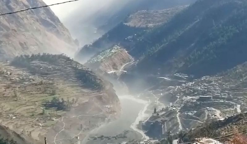 Mud and debris flowing at Chamoli District after a portion of Nanda Devi glacier broke off in Tapovan area of the northern state of Uttarakhand, 
