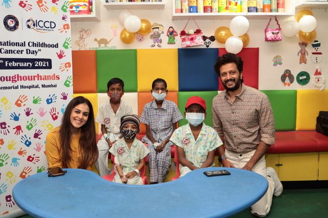 Riteish Deshmukh and Genelia D’Souza with children at a cancer ward in Mumbai on February 15, 2021