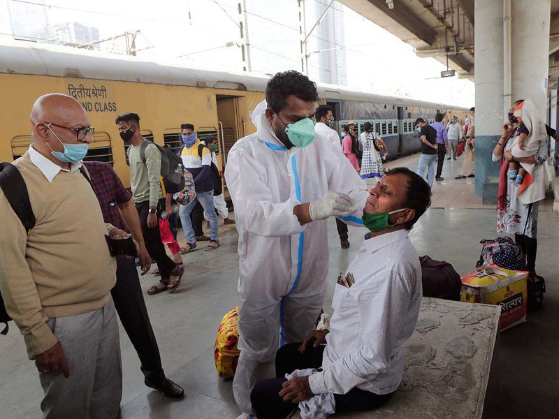 India covid test health worker sample railway station Mumbai