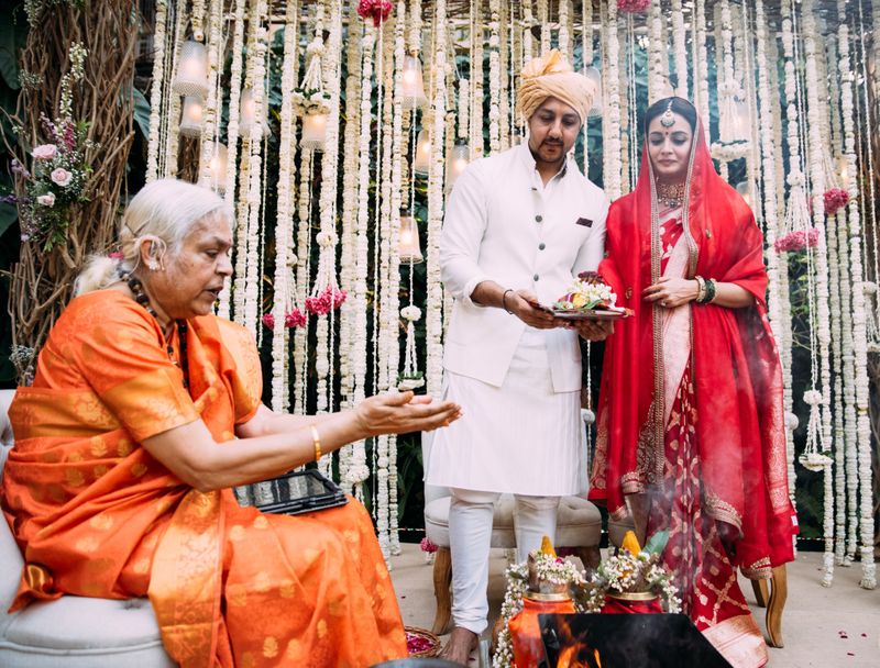 Dia Mirza on her wedding day with husband Vaibhav Rekhi and priestess Sheela Atta.