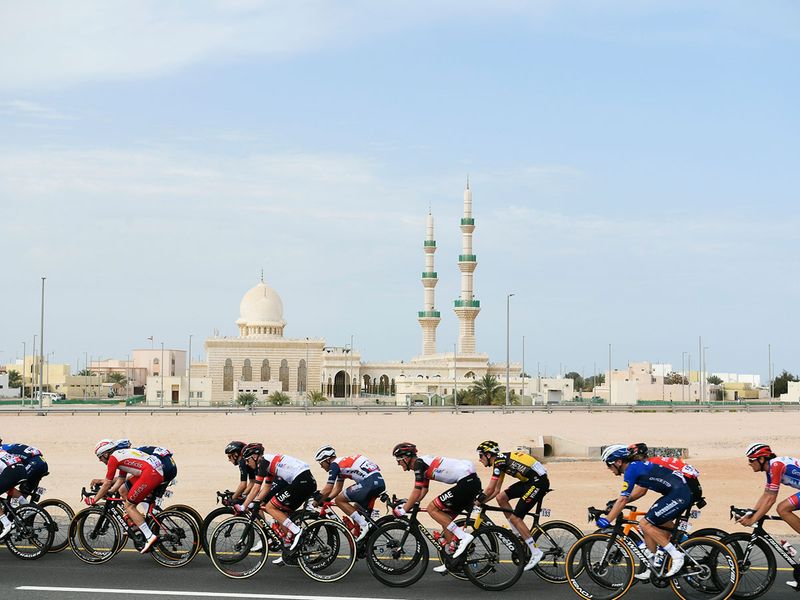 Cyclists pedal during the first stage of the UAE tour cycling race, from Al Dhafra Castle to Al Mirfa, Abu Dhabi, Sunday