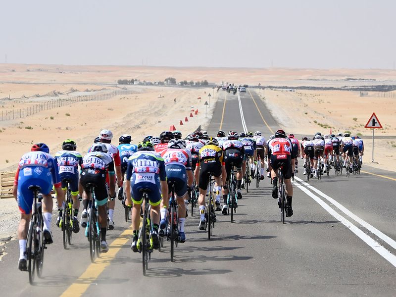 Cyclists pedal during the first stage of the UAE tour cycling race, from Al Dhafra Castle to Al Mirfa, Abu Dhabi, Sunday