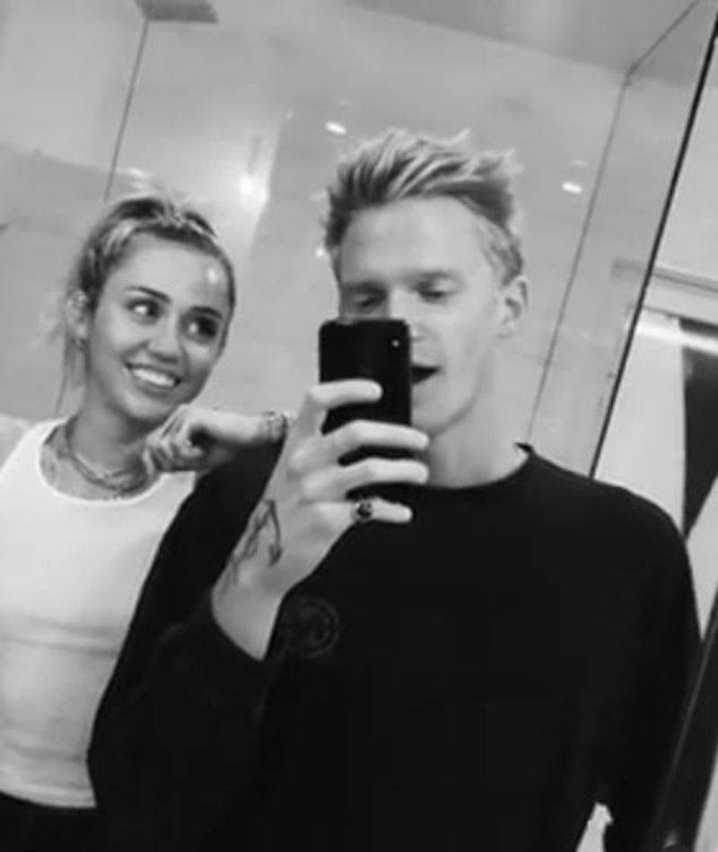 Miley Cyrus and Cody Simpson