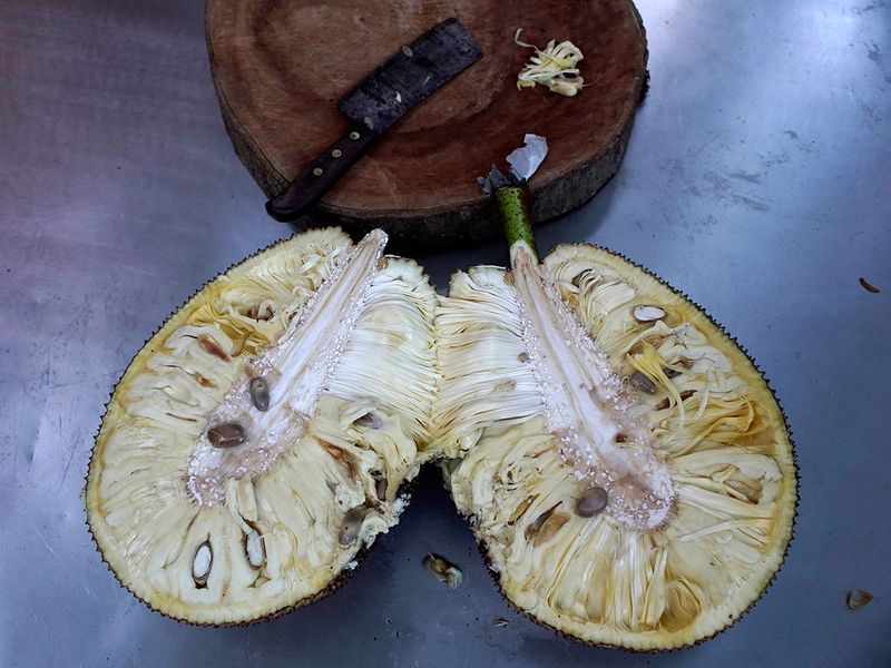 A jackfruit sits sliced open at the home of Marisa Furtado and Pedro Lobao, in Rio de Janeiro. 