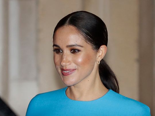 Britain's Meghan, the Duchess of Sussex leaves after attending the annual Endeavour Fund Awards in London, Thursday, March 5, 2020. The awards celebrate the achievements of service personnel who were injured in service and have gone on to use sport as part of their recovery and rehabilitation. (AP Photo/Kirsty Wigglesworth)