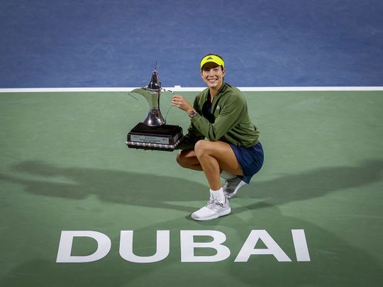 Garbine Muguruza with the Dubai Duty Free Championships trophy