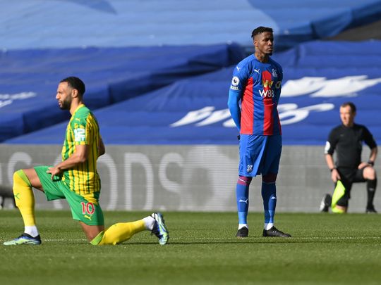 Wilfried Zaha refuses to take a knee, demanding more action against racism.
