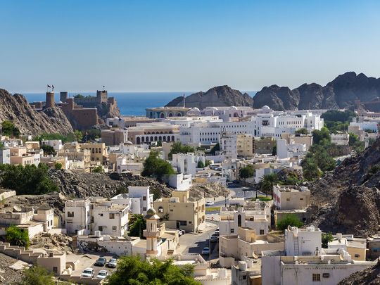 Stock Oman Muscat skyline people