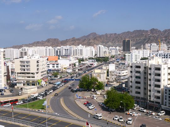 Stock Oman Muscat skyline people