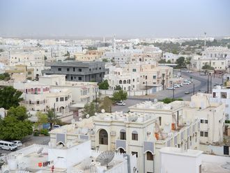 Stock Oman Muscat skyline people
