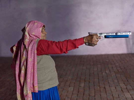 Chandro Tomar, 89, practices with her air pistol at a range being built at her house in the village of Johri, India, Feb. 14, 2021. Tomar, believed to be the oldest professional sharpshooter in the world, is a feminist icon in India who has mentored and coached dozens of young women in her village and beyond for more than 20 years. There’s even a Bollywood movie based on her life and that of fellow competitor and sister-in-law Prakashi Tomar.