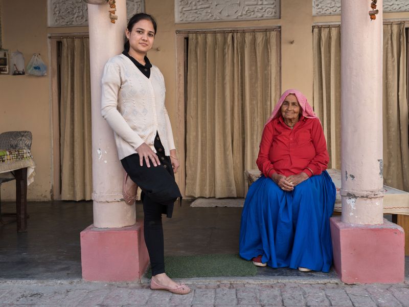 Tomar, 89, with her granddaughter Shefali Tomar, who now competes internationally, in the village of Johri, India