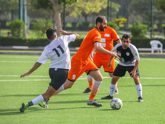 Football action at the Sharjah Labour Sports Tournament