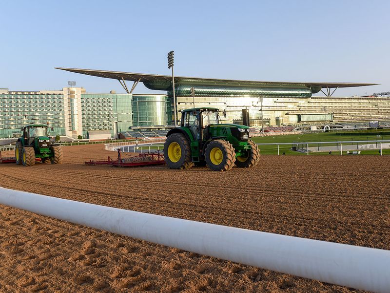 Workers furrow the track at Meydan on Monday ahead of Saturday's Dubai World Cup