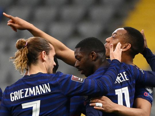 France's Ousmane Dembele celebrates with Antoine Griezmann and Anthony Martial after scoring against 
