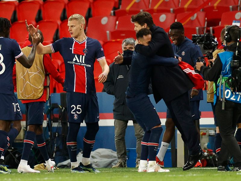 Paris St Germain's Neymar celebrates after the Bayern Munich Champions League match with Mauricio Pochettino.