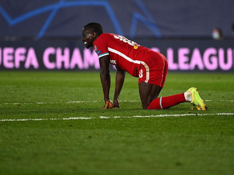 Liverpool's Senegalese striker Sadio Mane reacts during the UEFA Champions League first leg quarter-final football match between Real Madrid and Liverpool at the Alfredo di Stefano stadium in Valdebebas in the outskirts of Madrid on April 6, 2021. (Photo by GABRIEL BOUYS / AFP)