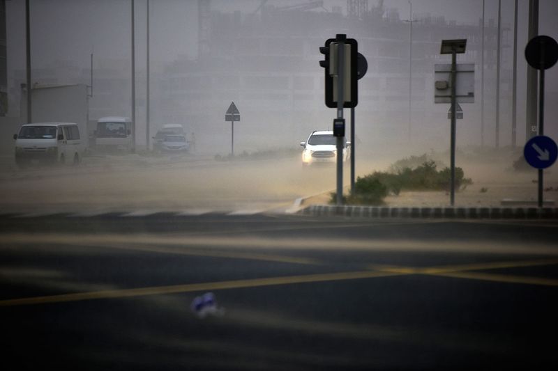 A sudden sandstorm in Dubai hinders the visibly of motorists and pedestrians in the city during the evening hours of the day on 28th April, 2021. 