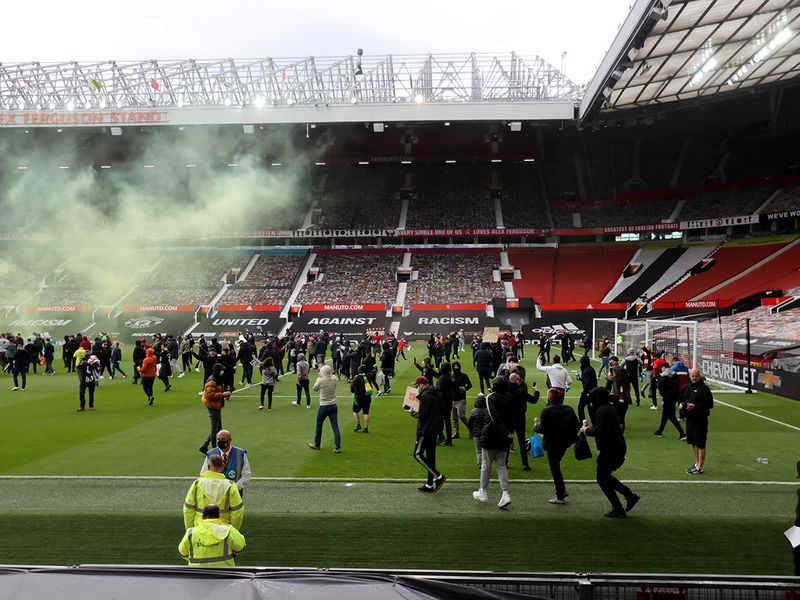Manchester United fans invade the pitch. May 2, 2021.