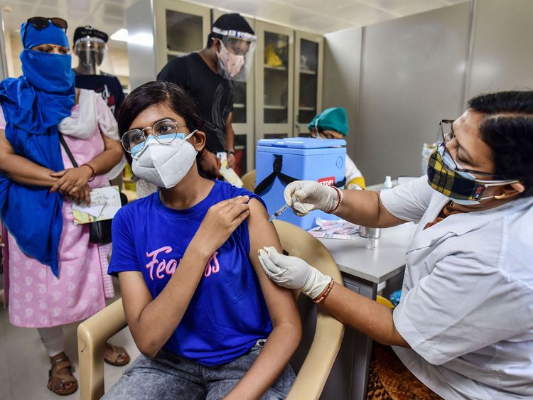 Prayagraj: A medical worker inoculates a young woman with a dose of the coronavirus vaccine at Moti Lal Nehru Medical College vaccination center during India's vaccination drive to 18 plus amid COVID-19 pandemic in Prayagraj, Wednesday, May 05, 2021. 
