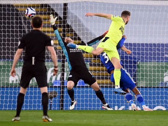 Newcastle United's Paul Dummett scores their second goal against Leicester