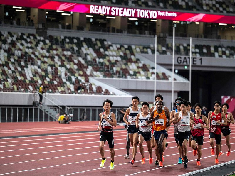 Athletes compete the men's 5,000m race during an athletics test event for the 2020 Tokyo Olympics at the National Stadium 