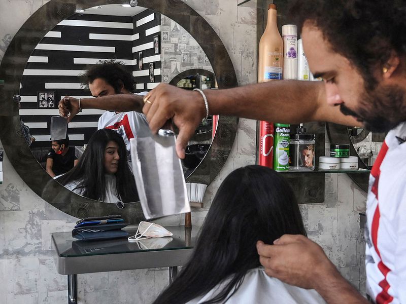 In photos: With cleavers and blowtorches, Pakistan barber offers hair-raising  cuts | Lifestyle-photos – Gulf News