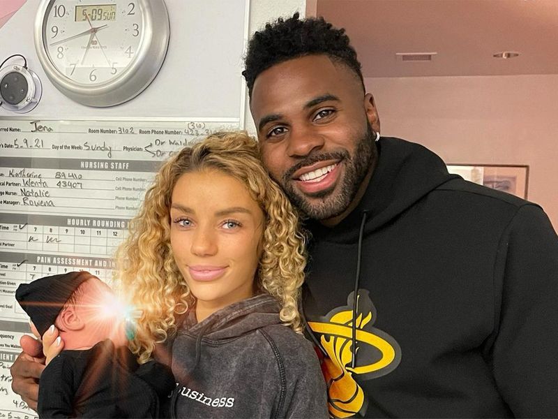 Jason Derulo and girlfriend Jena Frumes with their son