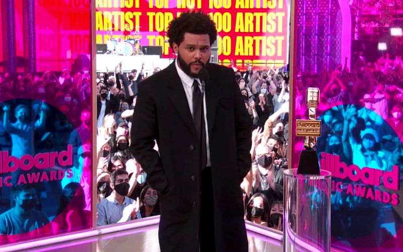 In this video image provided by NBC, The Weeknd accepts the top hot 100 album award during the Billboard Music Awards on Sunday, May 23, 2021. (NBC via AP)
