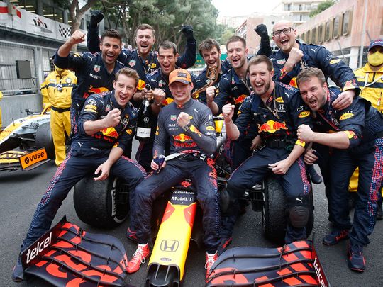 Red Bull driver Max Verstappen celebrates with his team after winning the Monaco Grand Prix 